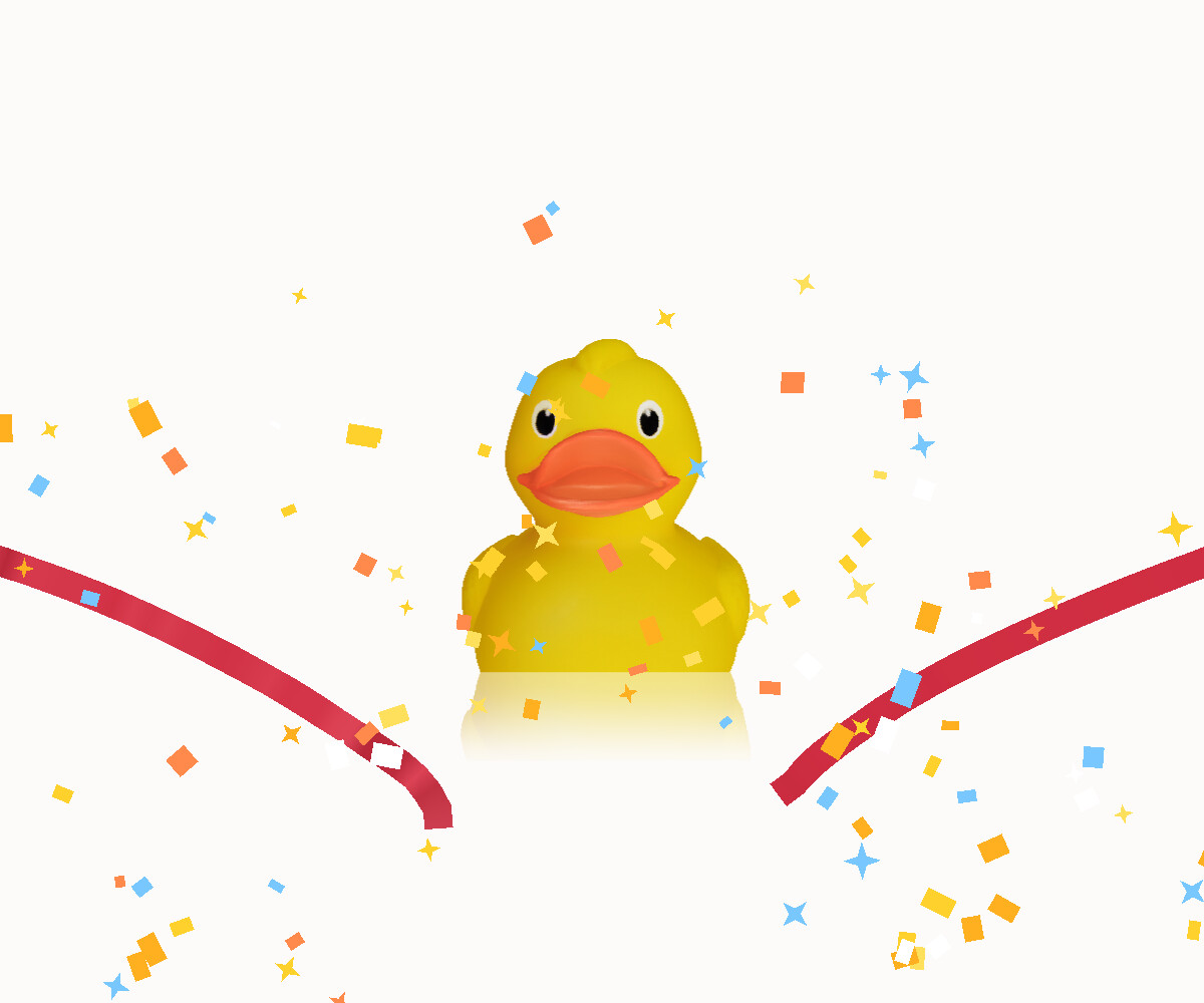 The duck mid-celebration, confetti raining down around him.